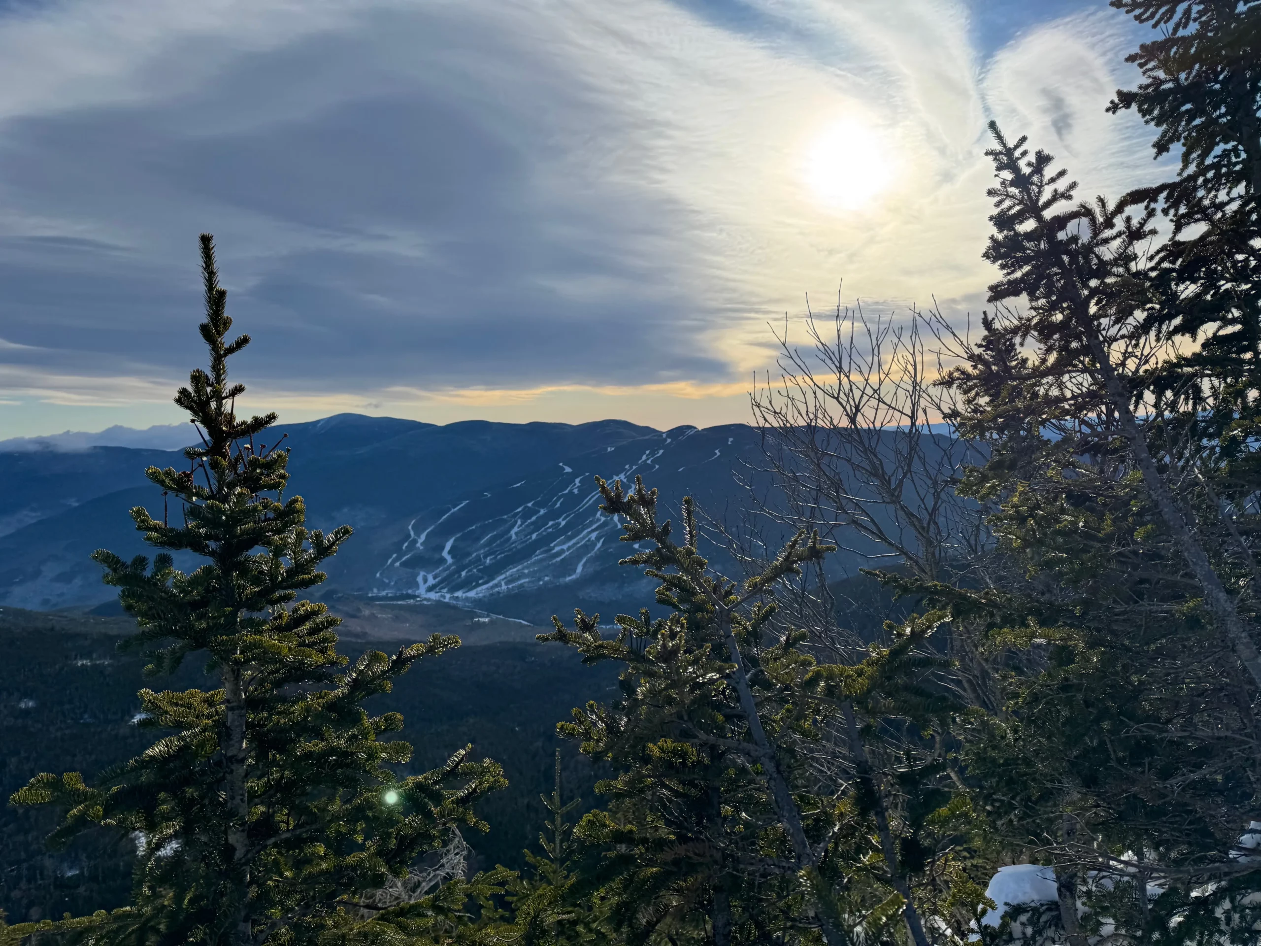 Storm clouds build above the White Mountains in New Hampshire, creating an environment to practice leading through uncertainty